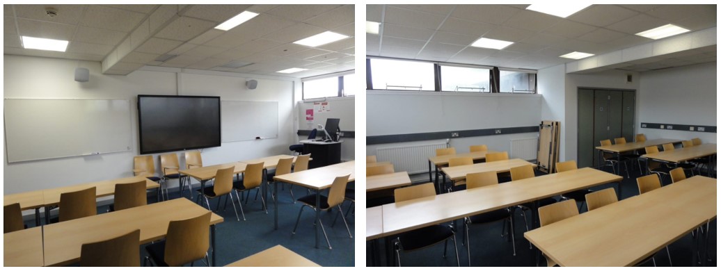 Classroom with rows of tables and chairs.